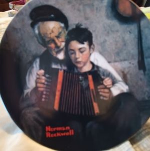 Norman Rockwell collector plate. The music maker 1981.